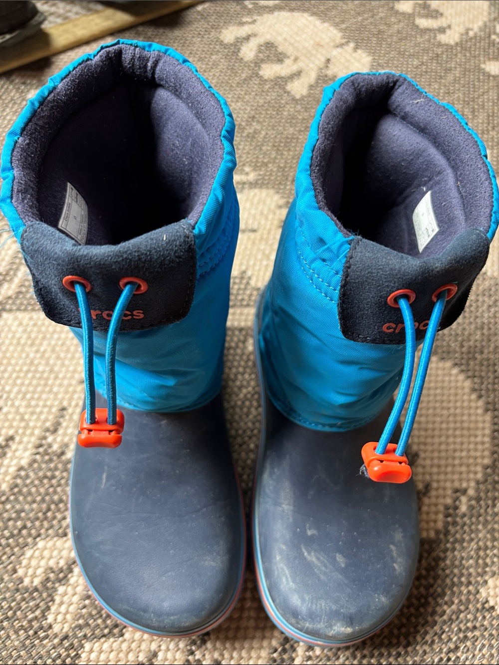 CROCS Kids Navy and Bright Blue Winter Boots with Orange Toggles